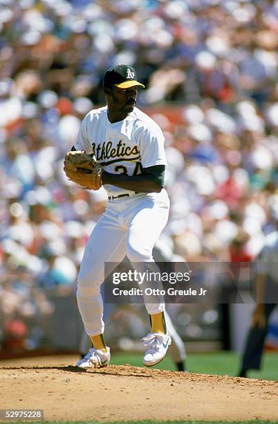 Dave Stewart of the Oakland Athletics pitches during a game in the 1989 season at Oakland-Alameda Coliseum in Oakland, California.