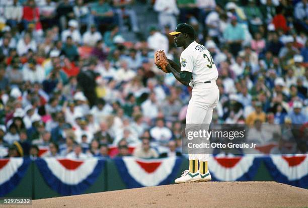 Dave Stewart of the Oakland Athletics pitches during game one of the 1989 American League Championship Series against the Toronto Blue Jays on...