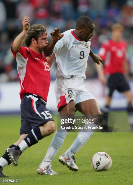 Kristofer Haestad of Norway in action against Paulo Wanchope of Costa Rica during The International Friendly match between Norway and Costa Rica at...