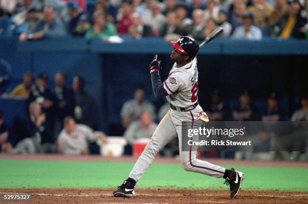 Deion Sanders of the Atlanta Braves swings at a pitch during Game five of the 1992 World Series against the Toronto Blue Jays at Skydome on October...