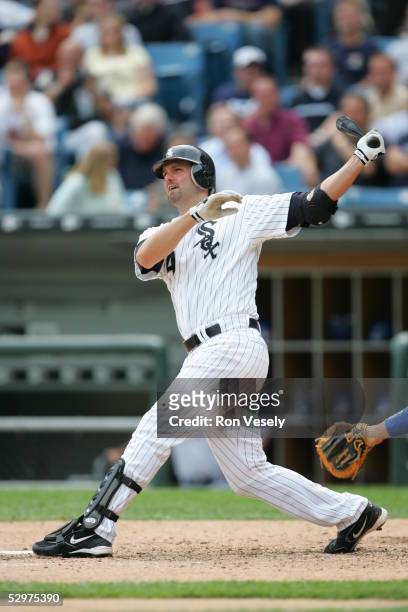 Paul Konerko, #14 of the Chicago White Sox hits his 10th home run of the season off of Ryan Drese during the game against the Texas Rangers at U.S....