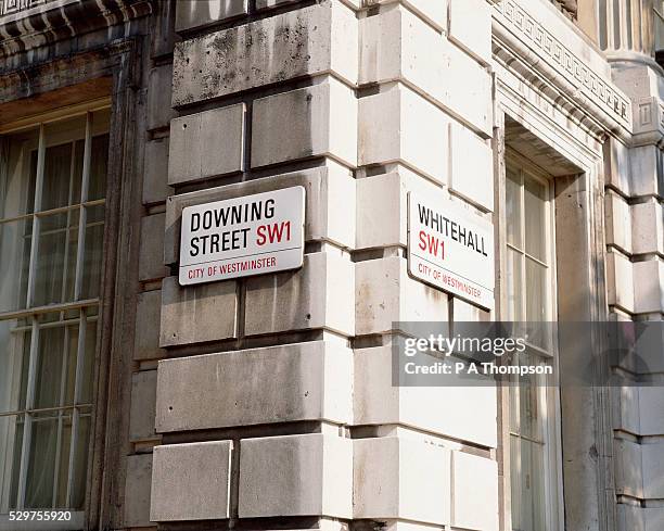 corner of downing street, london - downing street sign stock pictures, royalty-free photos & images