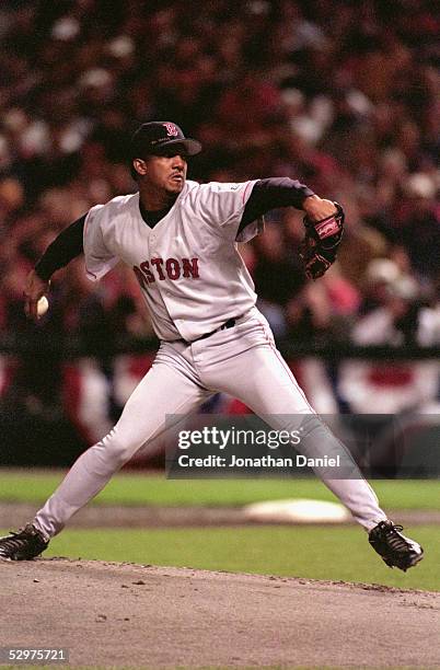 Pitcher Pedro Martinez of the Boston Red Sox delivers a pitch against the Cleveland Indians during the game at Jacobs Field on Cleveland, Ohio, on...