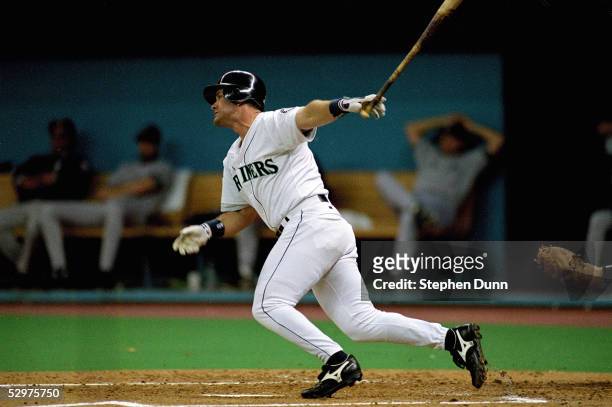 Edgar Martinez of the Seattle Mariners hits a grand slam home run in the eighth inning of Game four of the 1995 American League Divisional Series...