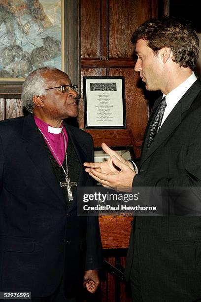 The Explorers Club President Richard C. Wiese shows Archbishop Emeritus Desmond Tutu around The Explorers Club as they attend a ceremony in which...