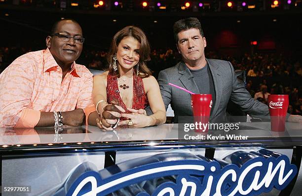 Idol Judges Randy Jackson , Paula Abdul and Simon Cowell pose at the "American Idol" final performance show at the Kodak Theatre on May 24, 2005 in...