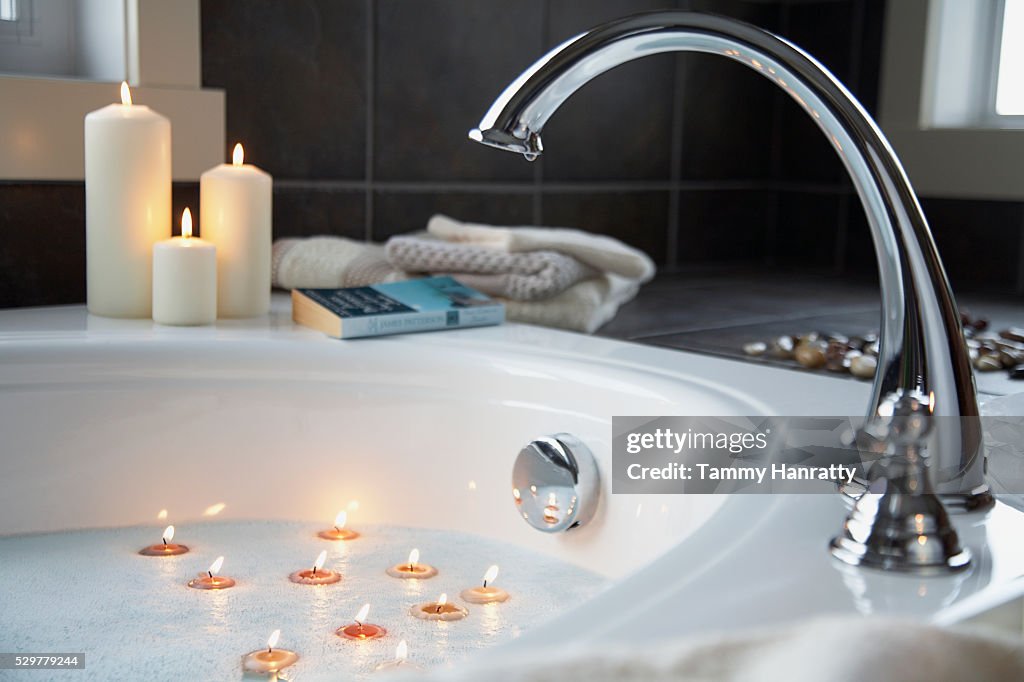 Tealights floating in bathtub