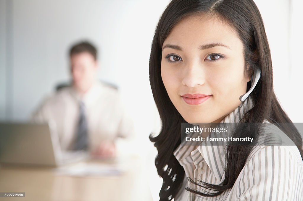 Businesswoman wearing headset