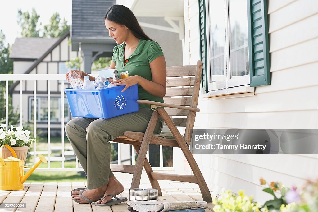 Woman sorting recycling