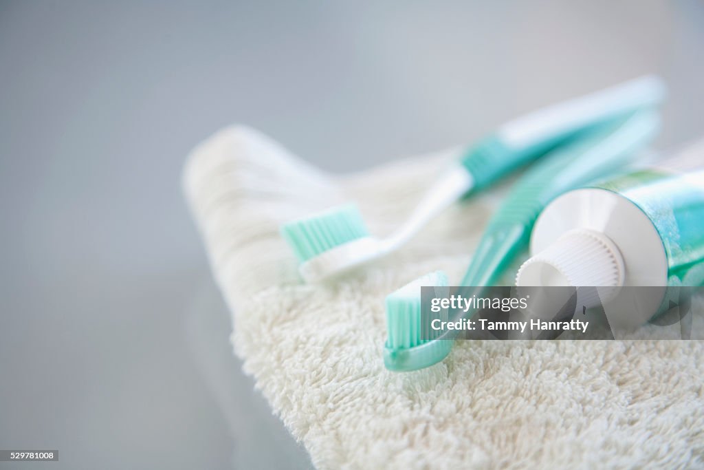 Toothpaste, tooth brushes and wash cloth