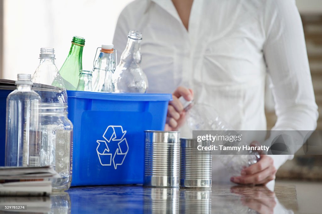 Woman sorting recycling