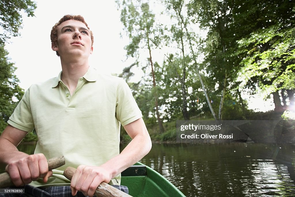 Man Rowing a Boat