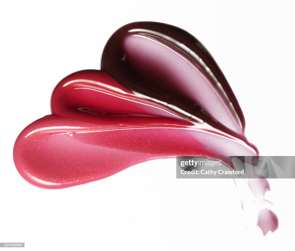 Three smeared lip gloss