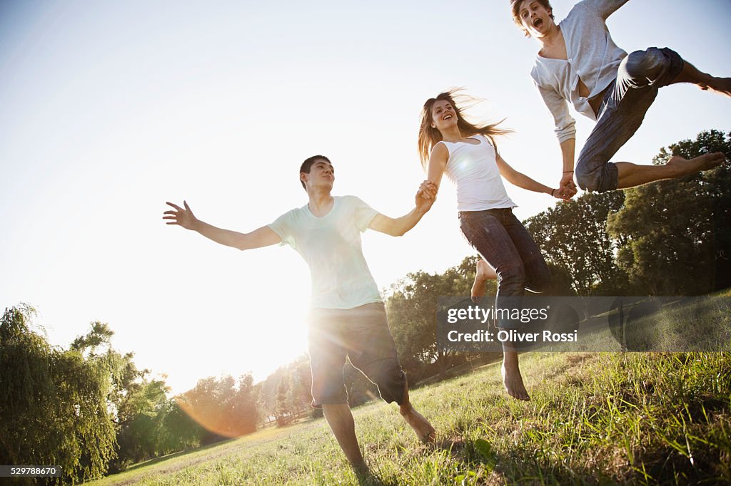 Young friends playing in a park