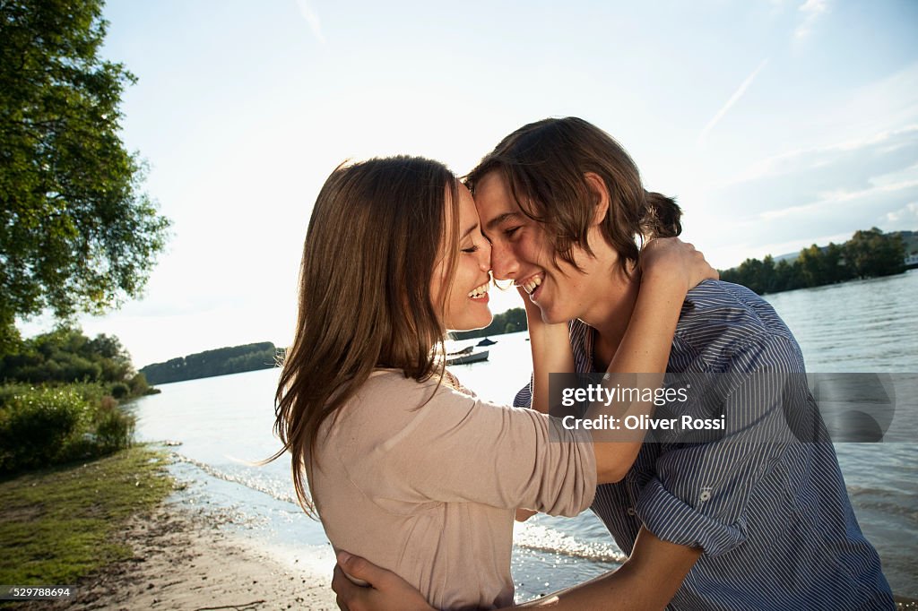 Young couple beside a lake