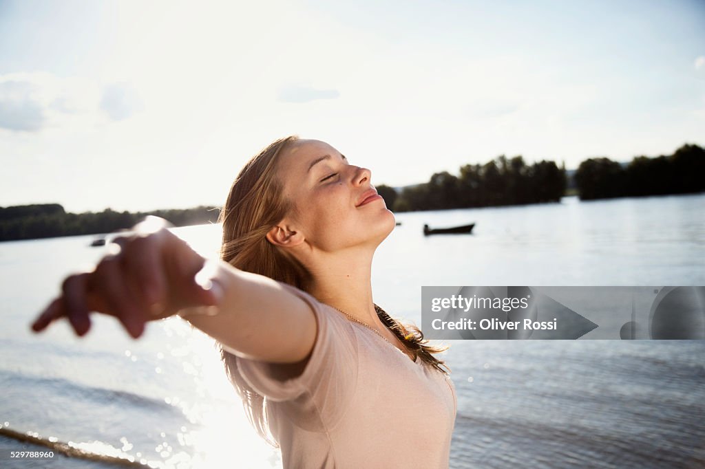 Young woman enjoying the sunshine