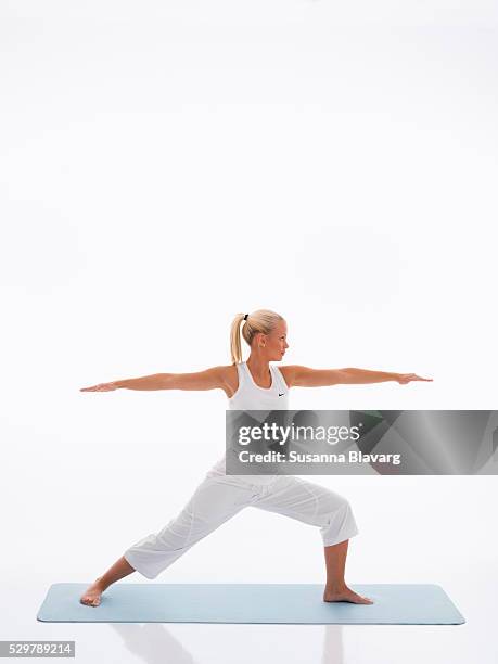 teenage girl doing yoga - blonde yoga stock pictures, royalty-free photos & images