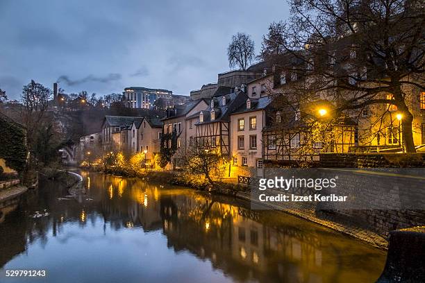 grund houses along the alzette river, luxembourg - grand duke henri of luxembourg stockfoto's en -beelden