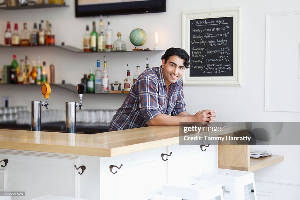 Portrait of barman in cafe