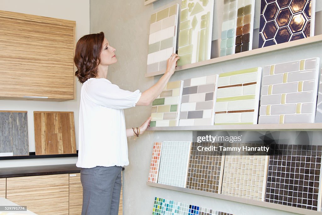 Woman looking at color swatches