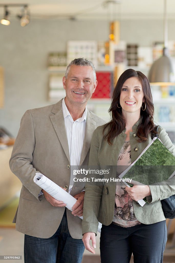 Portrait of man and woman in shop