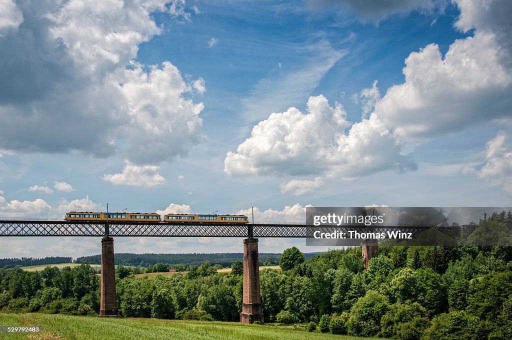 Railroad bridge with commuter train