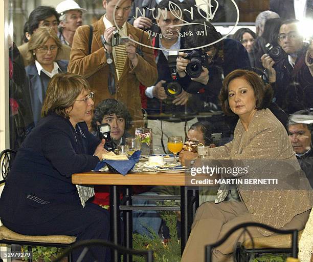 Soledad Alvear de la Democracia Cristiana, y Michelle Bachelet del Partido Socialista, conversan en un cafe centrico de la ciudad de Santiago, el 25...