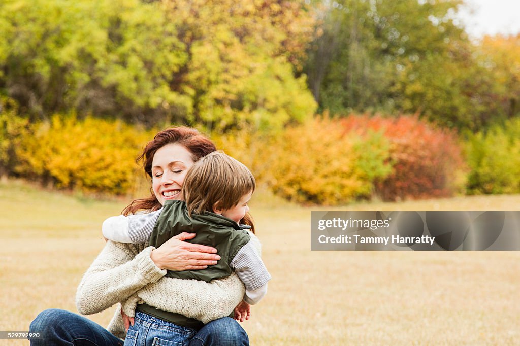 Mother embracing her son (4-5)