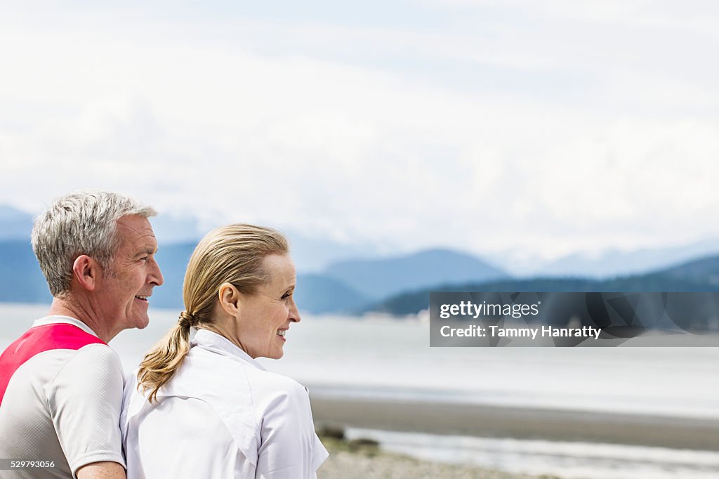 Senior couple admiring view of lake