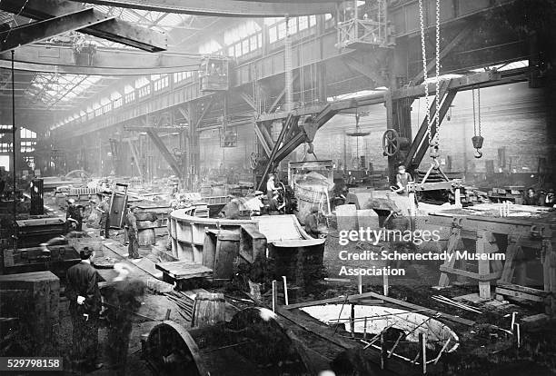 Employees work inside Building 83 at General Electric's Schenectady Works.