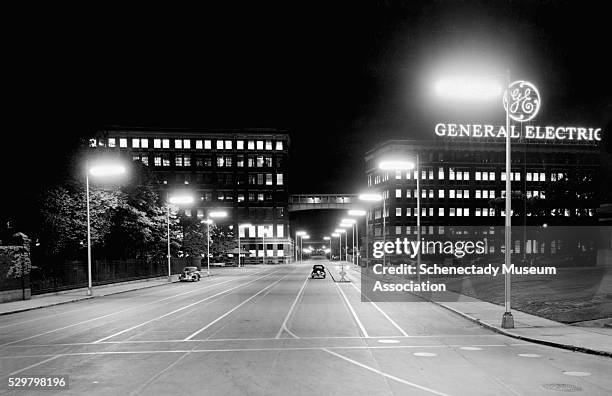 Fluorescent lights illuminate the roadway at the main entrance to the General Electric Company.