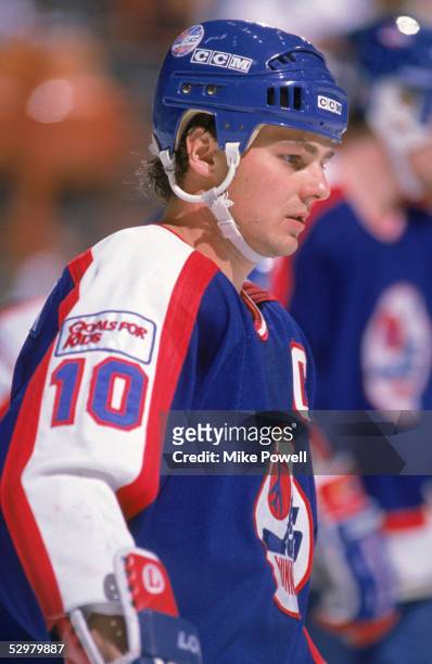 Dale Hawerchuk of the Winnipeg Jets looks on during their game against the Los Angeles Kings at the Great Western Forum circa 1988 in Inglewood,...