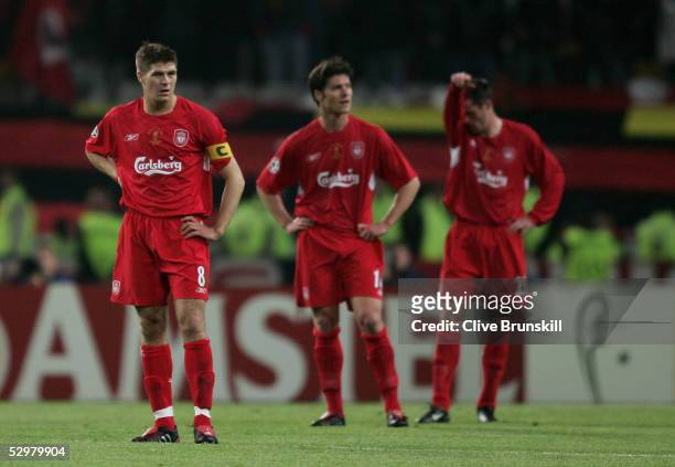Liverpool captain Steven Gerrard , Liverpool midfielder Xabi Alonso of Spain and Liverpool defender Jamie Carragher react during the European...