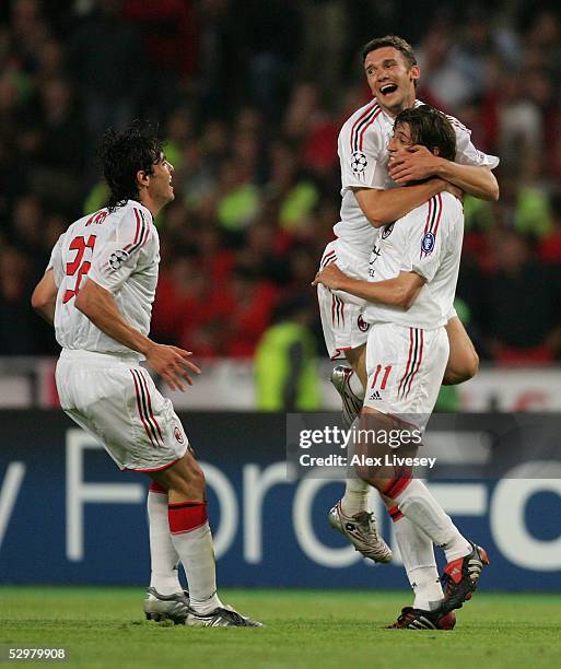 Milan forward Andriy Shevchenko of Ukraine celebrates with AC Milan forward Hernan Crespo of Argentina and AC Milan forward Ricardo Kaka of Brazil...