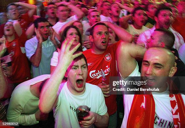 Liverpool fans react to Maldini's goal during the UEFA Champions League match between Liverpool and AC Milan on May 25, 2005 in Liverpool, England.