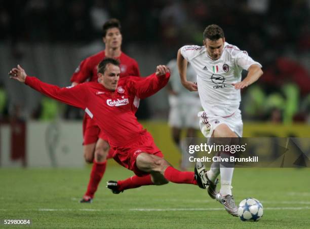 Liverpool midfielder Dietmar Hamann of Germany fights for the ball with AC Milan forward Andriy Shevchenko of Ukraine during the European Champions...