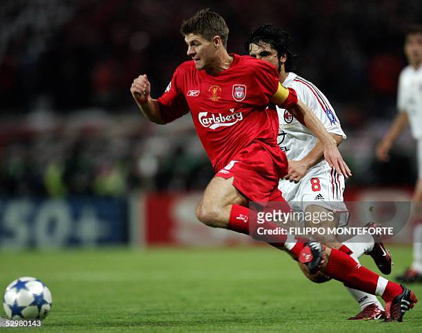 Liverpool's England's captain and midfielder Steven Gerrard scores the first goal for his team during the UEFA Champions league football final AC...