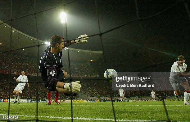 Liverpool goalkeeper Jerzy Dudek of Poland saves a shot from AC Milan forward Andriy Shevchenko of Ukraine during the European Champions League final...