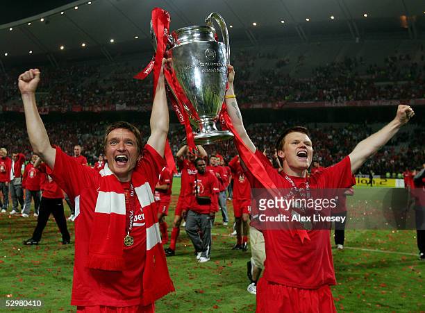Liverpool defender John Arne Riise of Norway and midfielder Vladimir Smicer of Czech Republic lifts the European Cup after Liverpool won the European...