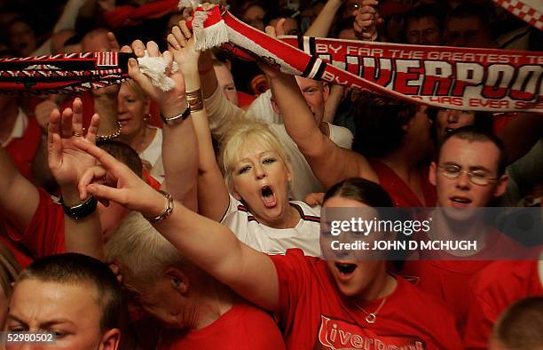 Liverpool fans show their joy in a pub in their hometown during the Champions League Final between Liverpool FC and AC Milan in Istanbul, 25 May,...