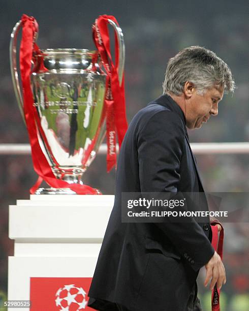 Milan's coach Carlo Ancelotti walks past the throphy at the end of the UEFA Champions league football final AC Milan vs Liverpool, 25 May 2005 at the...