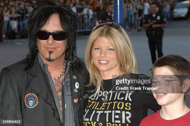 Nikki Sixx of the band "Motley Crue" and Donna D'Errico arrive at the charity premiere of "Star Wars: Episode III - Revenge of the Sith," a benefit...