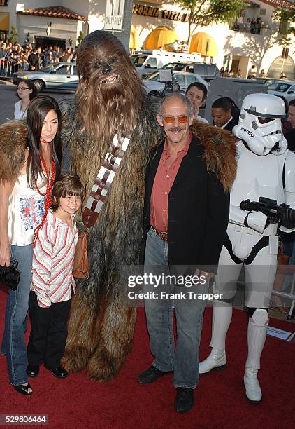 Christopher Lloyd and family stand with Chewbacca, at the charity premiere of "Star Wars: Episode III - Revenge of the Sith," a benefit for "Artists...