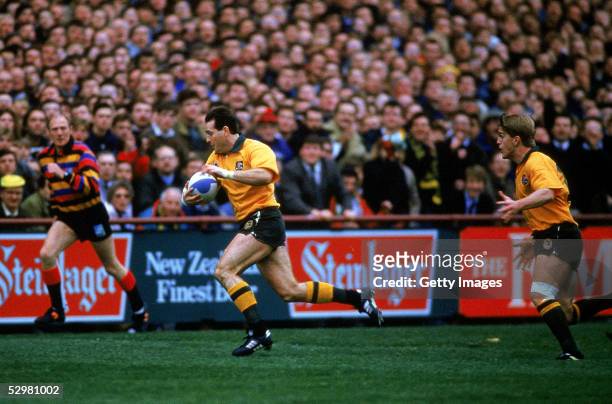David Campese of the Wallabies makes a break during the Australia v New Zealand semi final match during the 1991 Rugby Union World Cup at Lansdowne...