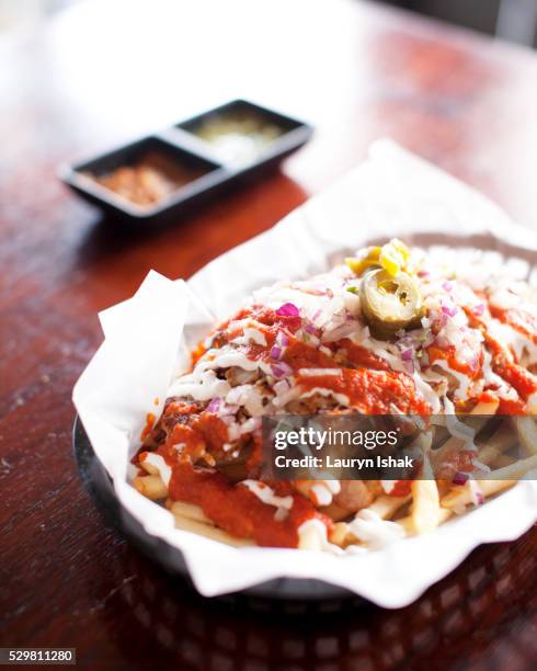 kimchi fries - kimchi stock pictures, royalty-free photos & images