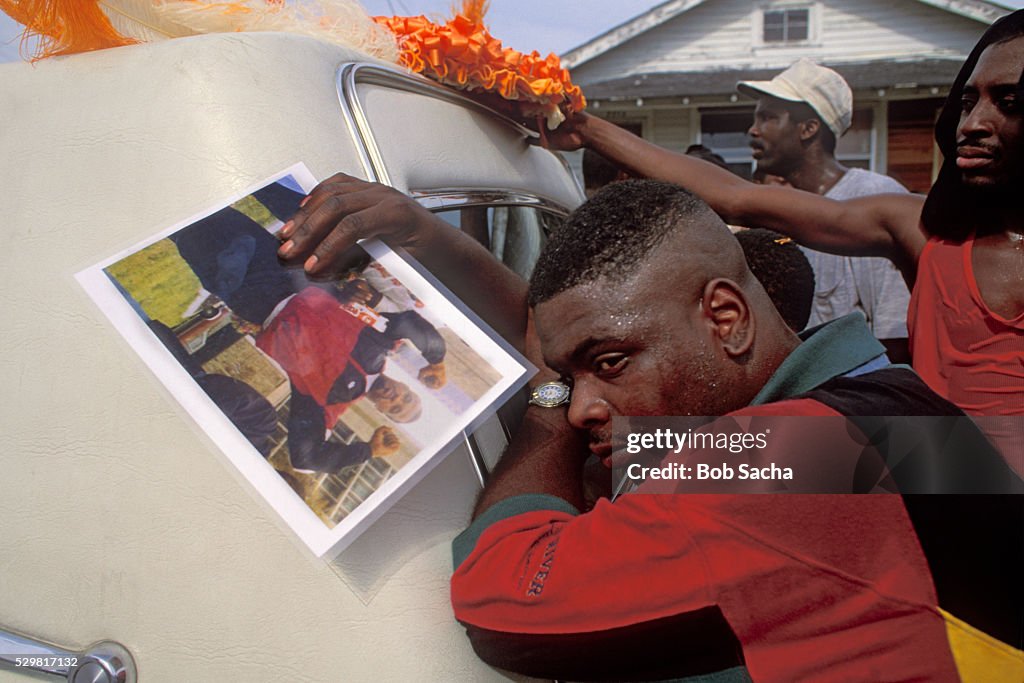 Man Mourning Deceased Friend