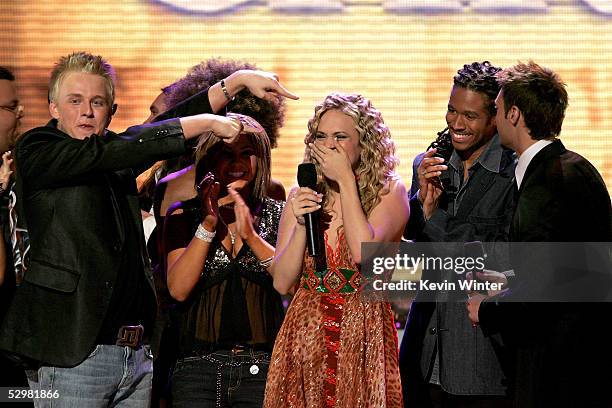 After being named the new American Idol, singer Carrie Underwood is joined by fellow contestants onstage during the American Idol Finale: Results...