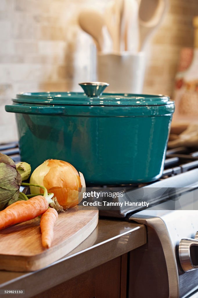 Pot on stove in domestic kitchen