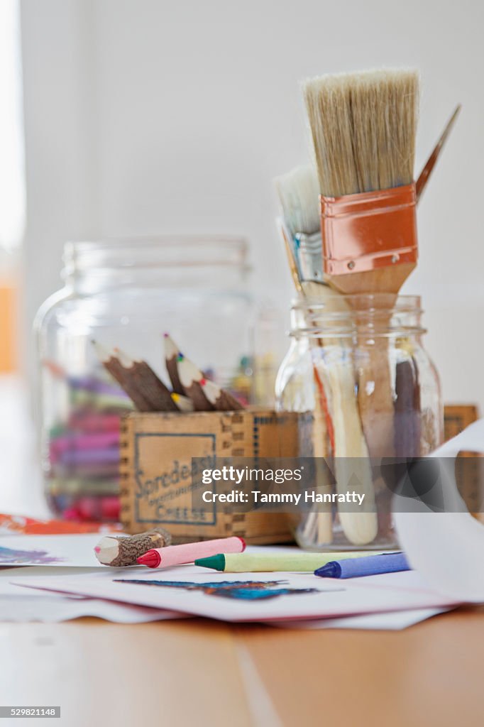 Close up of painting and drawing tools on desk