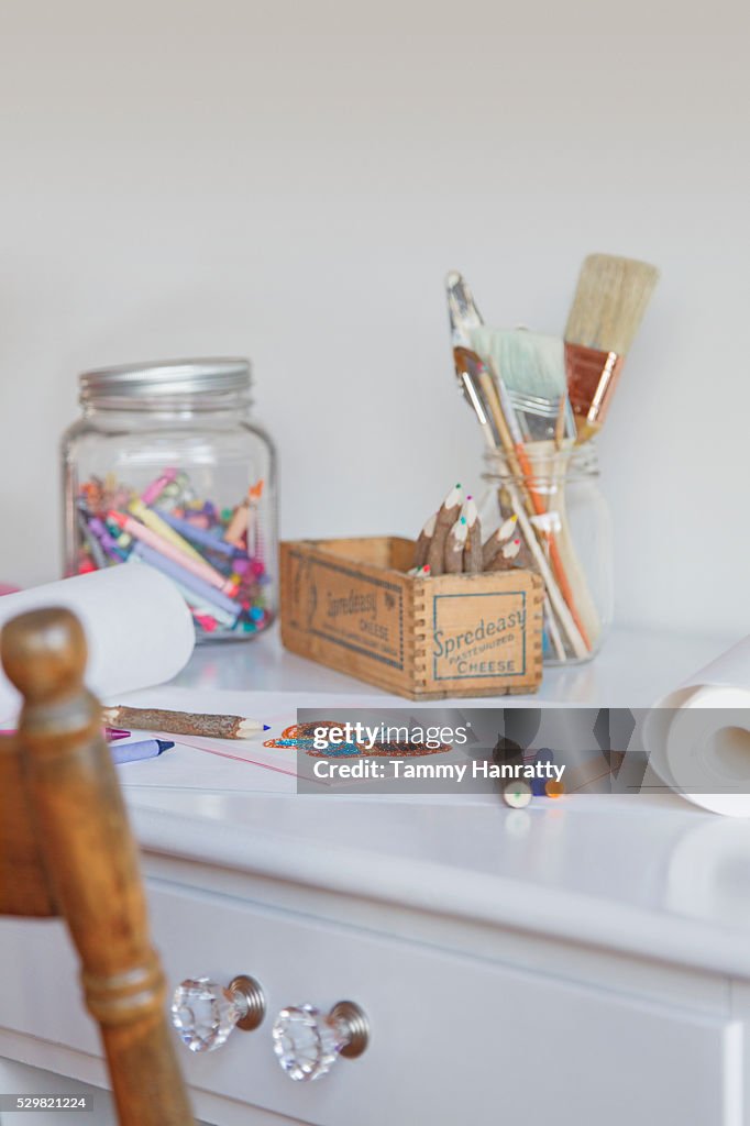 Close up of painting and drawing tools on desk